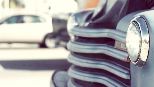 Old Car With Open Hood On Street, Capturing A Vintage Repair Moment.